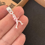 Berloque Corredora Pink