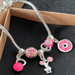 Pulseira com Berloques Cross Pink
