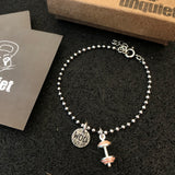Pulseira WOD com barra rosa