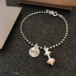 Pulseira WOD com barra rosa