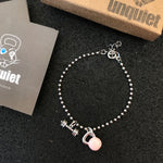 Pulseira Barra com Kettlebell rosa