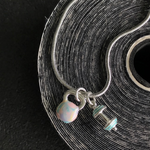 Pulseira Kettlebell Tie Dye com Barra Turquesa