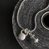 Pulseira Kettlebell Tie Dye com Barra Turquesa