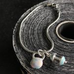 Pulseira Kettlebell Tie Dye com Barra Turquesa