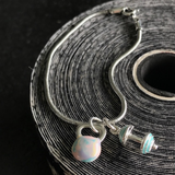 Pulseira Kettlebell Tie Dye com Barra Turquesa