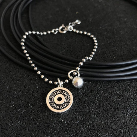 Pulseira Anilha e Kettlebell