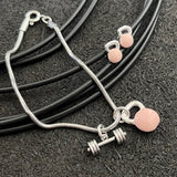 Conjunto Pulseira + Brinco Kettlebell Rosa