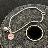 Pulseira Kettlebell com WOD Pink