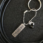 Chaveiro Unstoppable + Kettlebell preto